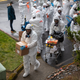 A cleaning crew takes disinfecting equipment into the Life Care Center, a nursing home connected to at least 29 covid-19 deaths, on March 12, 2020 in Kirkland, Washington.